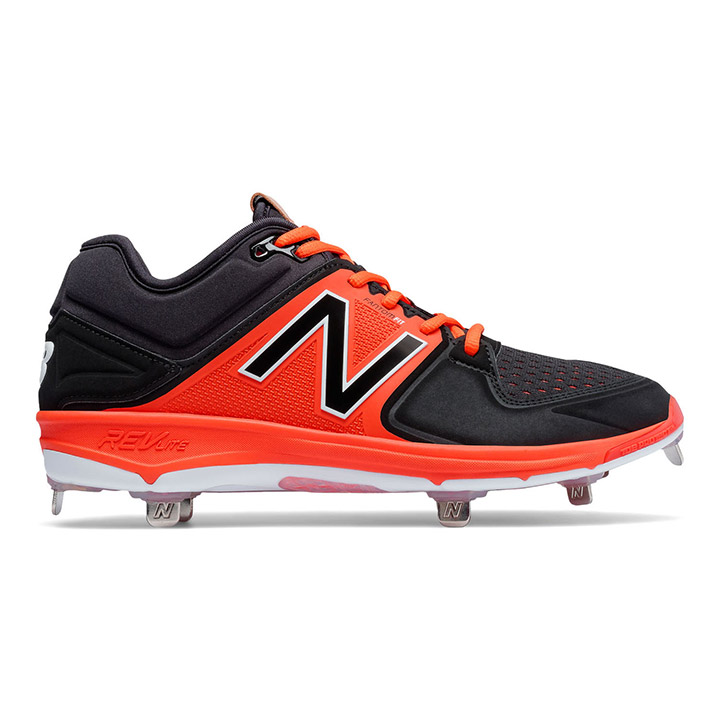 orange and black new balance baseball cleats